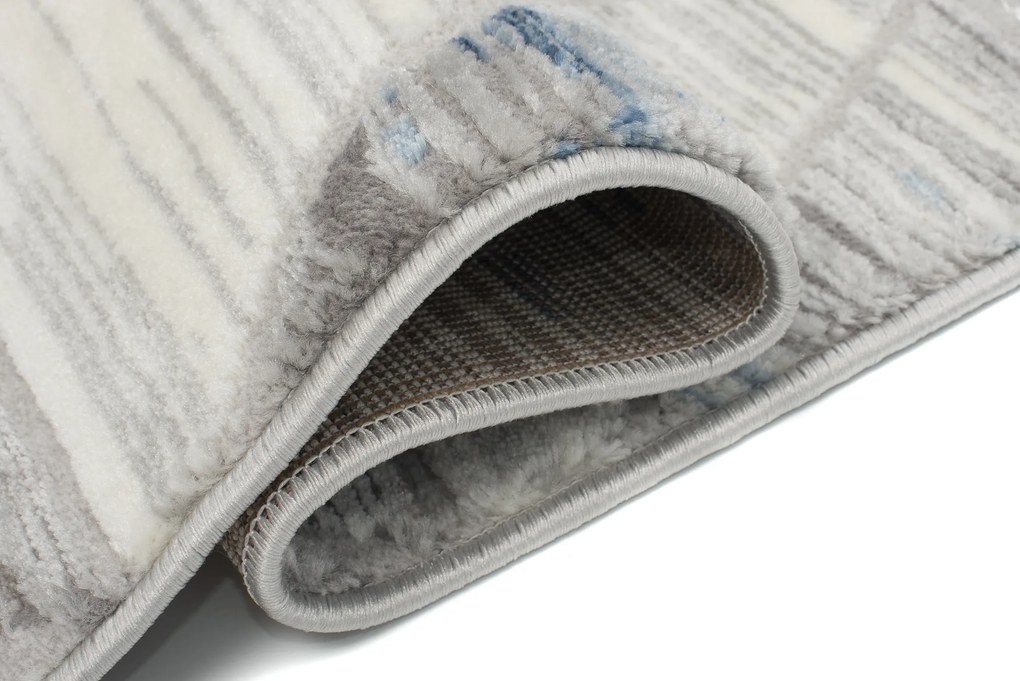 TA Koberec E460A SVETLO SIVÁ/TMAVOMODRÁ ASTHANE