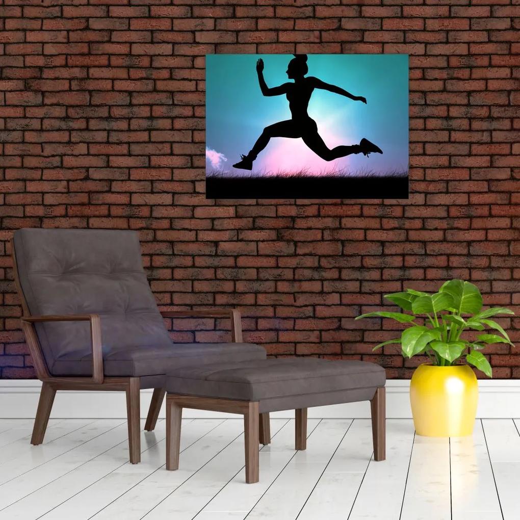 Sklenený obraz skákajúce siluety ženy (70x50 cm)