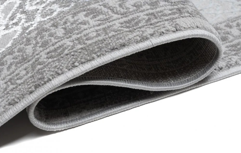 Exkluzívny bielo-sivý dizajnový interiérový koberec so vzorom Šírka: 80 cm | Dĺžka: 150 cm