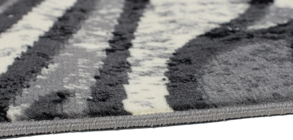 TA Koberec 2640A TMAVO SIVÁ LACNÁ PP CRM Rozmer: 80x250 cm