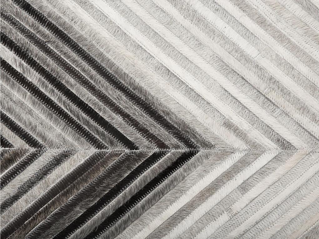 Kožený koberec 140 x 200 cm sivý AYTEPE Beliani