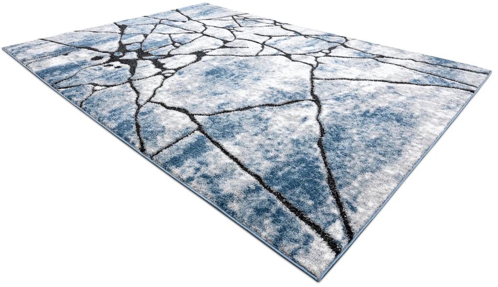 Moderný koberec COZY 8873  Cracks, prasknutý betón - Štrukturálny, dve vrstvy rúna, modrá