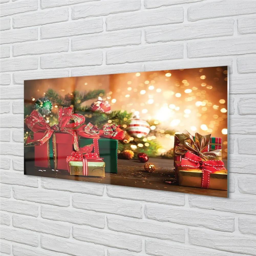 Sklenený obraz Darčeky vianočné ozdoby svetla 120x60 cm
