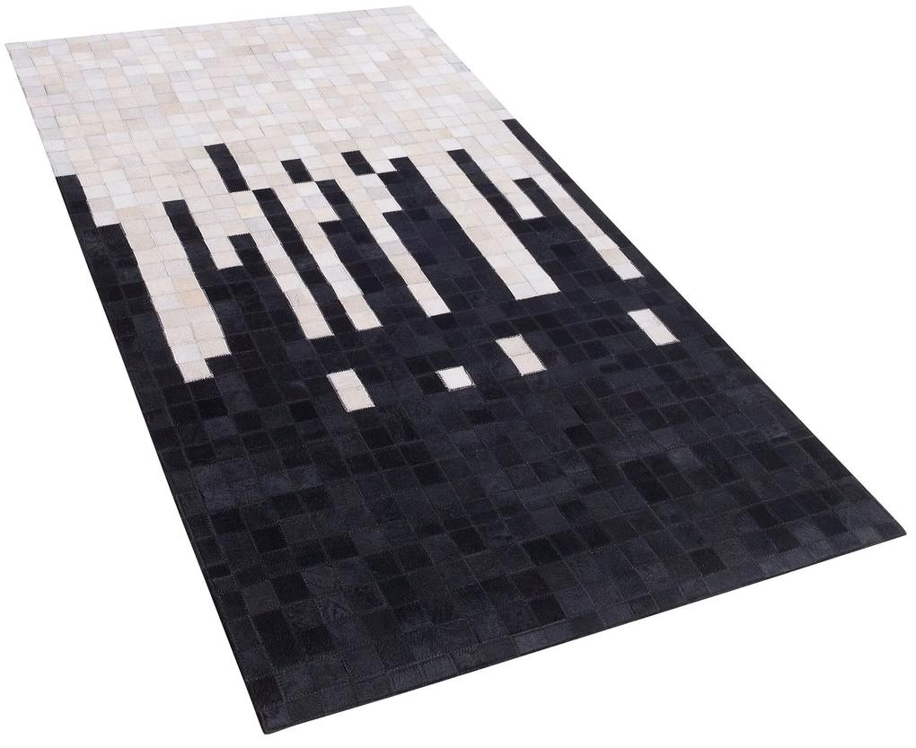 Kožený koberec 80 x 150 cm čierna/biela BOLU Beliani