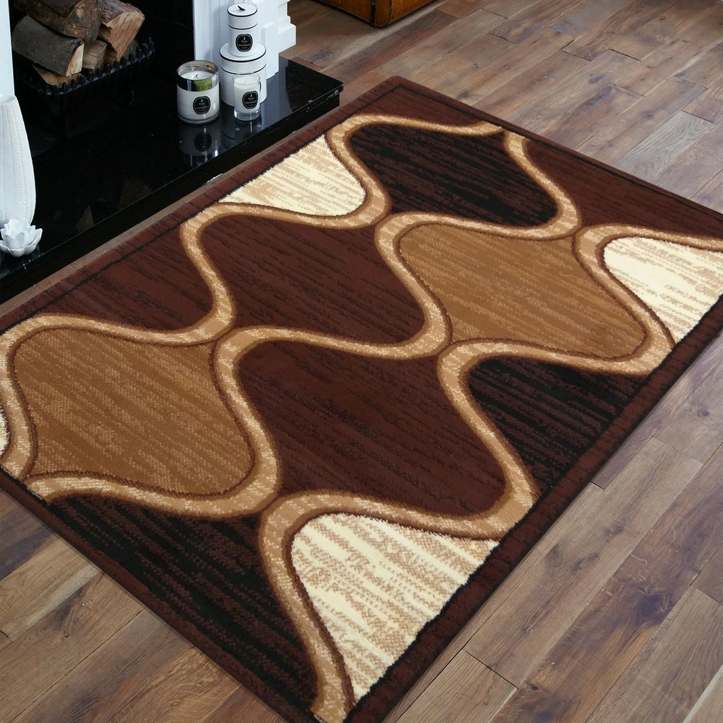 Koberec Alfa 04N – hnedý s abstraktným vzorom do interiéru Rozmer: 60x100 cm