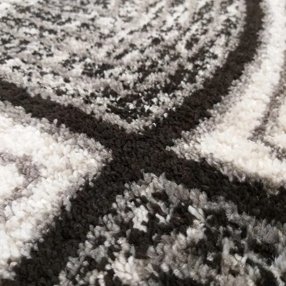 Kvalitný hnedý koberec v modernom designe Šírka: 60 cm | Dĺžka: 100 cm