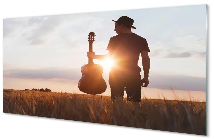 Obraz plexi Gitara muž 100x50 cm