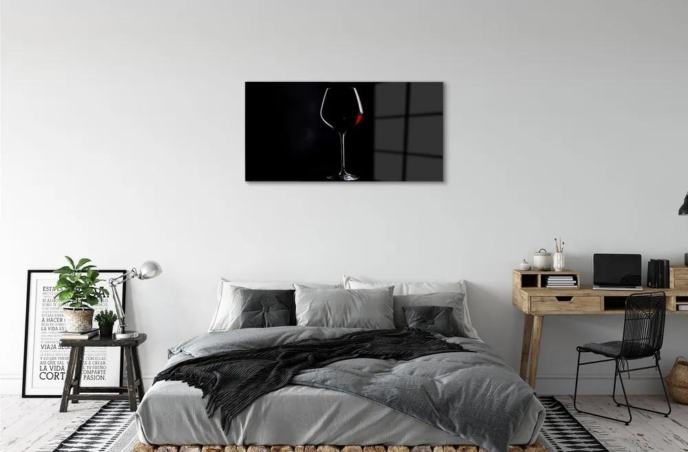 Obraz na skle Čierne pozadie s pohárom vína 140x70 cm
