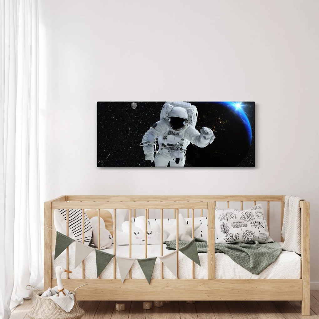 Obraz - Astronaut vo vesmíre (120x50 cm)