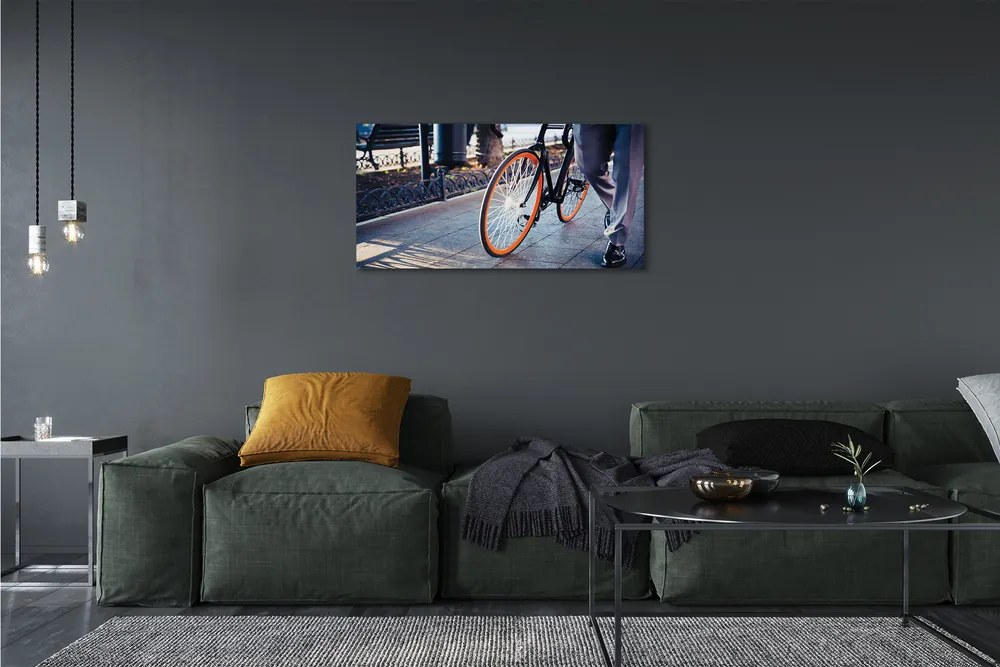 Obraz canvas Mesto na bicykli noha 120x60 cm