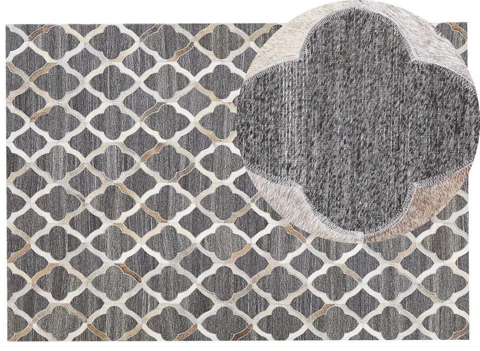 Kožený koberec 140 x 200 cm sivá/béžová ROLUNAY Beliani