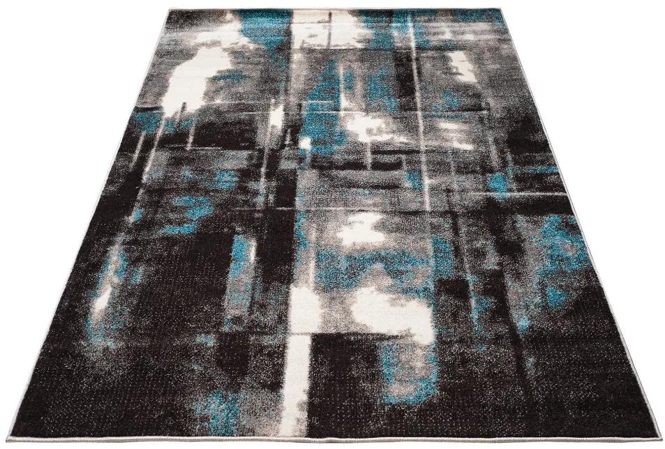 Moderný koberec s batikovaným vzorom