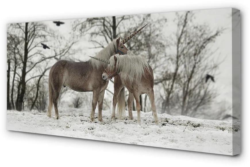 Obraz na plátne Zimný lesné jednorožce 100x50 cm