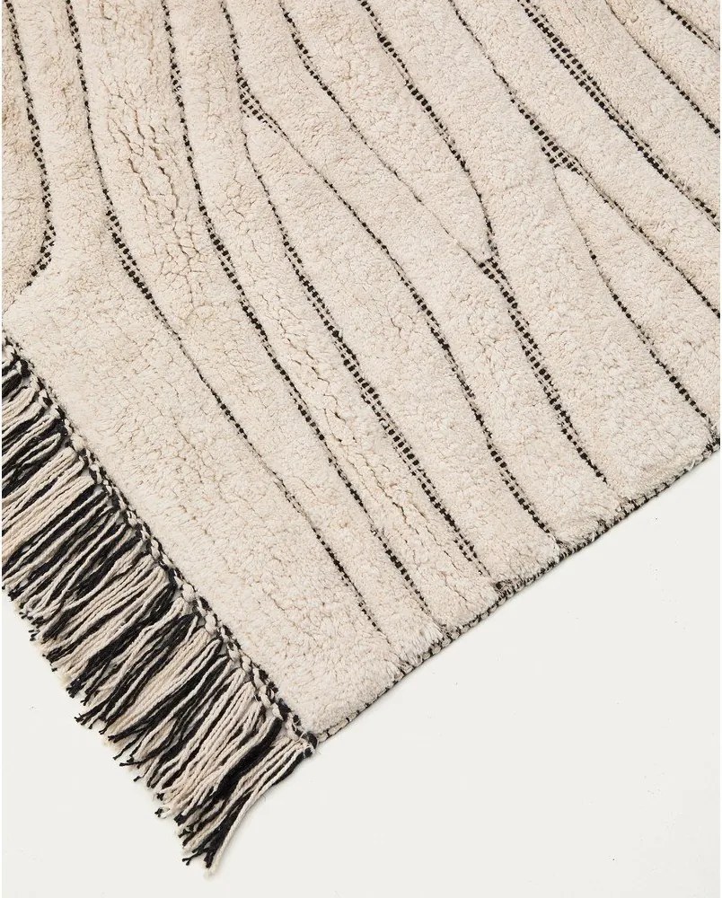 Béžová kúpeľňová predložka 50x70 cm Crilda – Kave Home