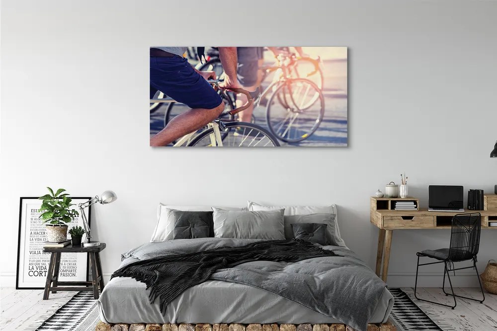 Obraz plexi Cyklisti ľudí 140x70 cm