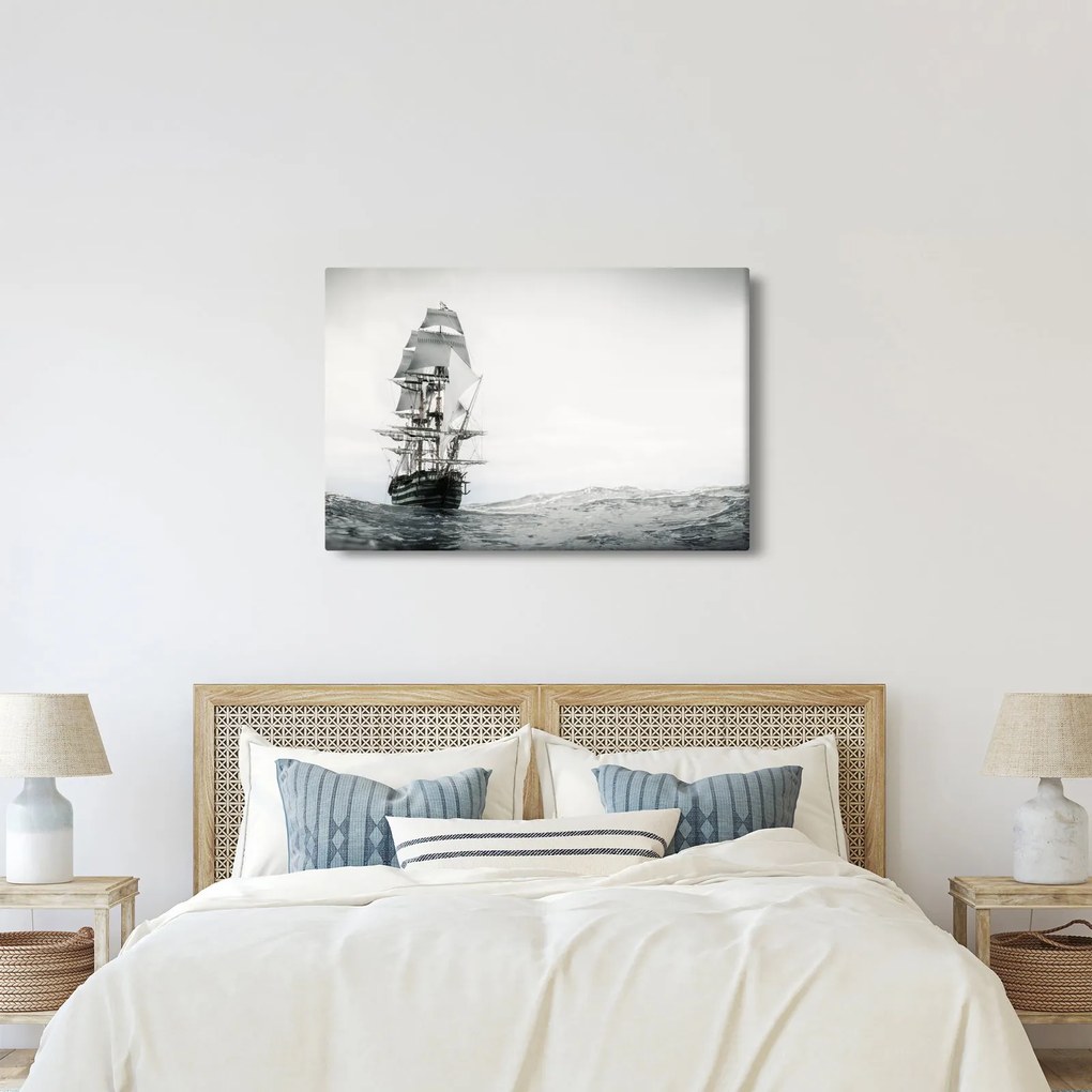 Obraz - Loď plávajúca po oceáne (90x60 cm)