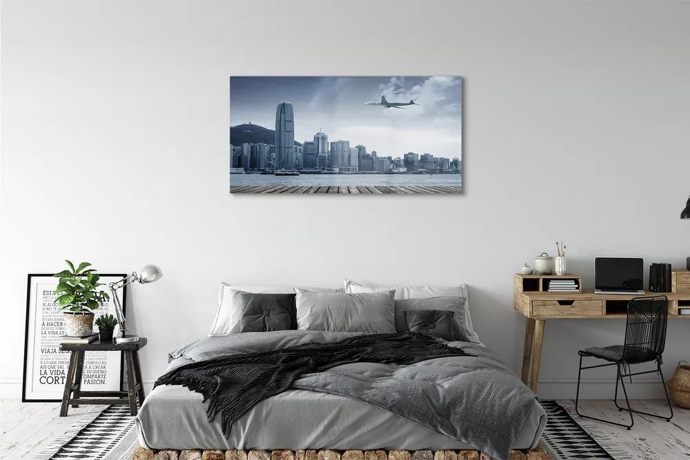 Obraz plexi Lietadiel mraky město 125x50 cm