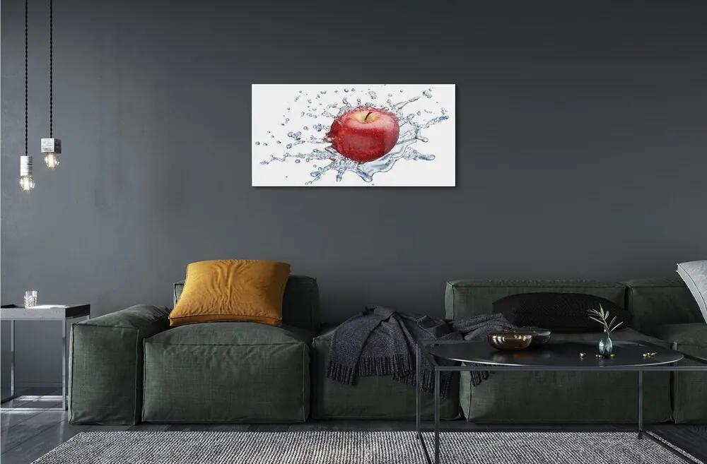 Obraz na skle Červené jablko vo vode 125x50 cm