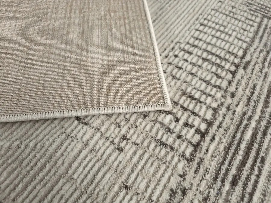 DC Koberec Oman 632 tmavá vizion zlatá Rozmer: 140×190 cm