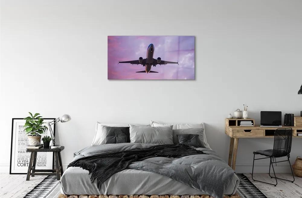 Obraz na skle Mraky obloha lietadlo 120x60 cm