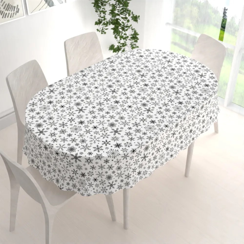 Biante Vianočný bavlnený oválny obrus Sandra SA-403 Čierne vločky na bielom 140x180 cm