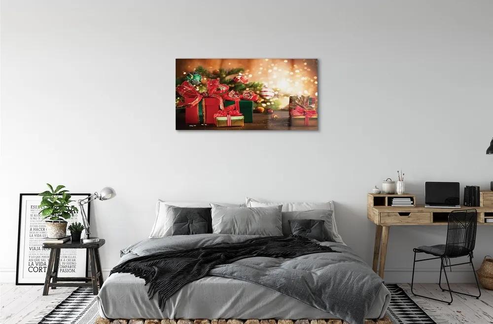 Sklenený obraz Darčeky vianočné ozdoby svetla 125x50 cm