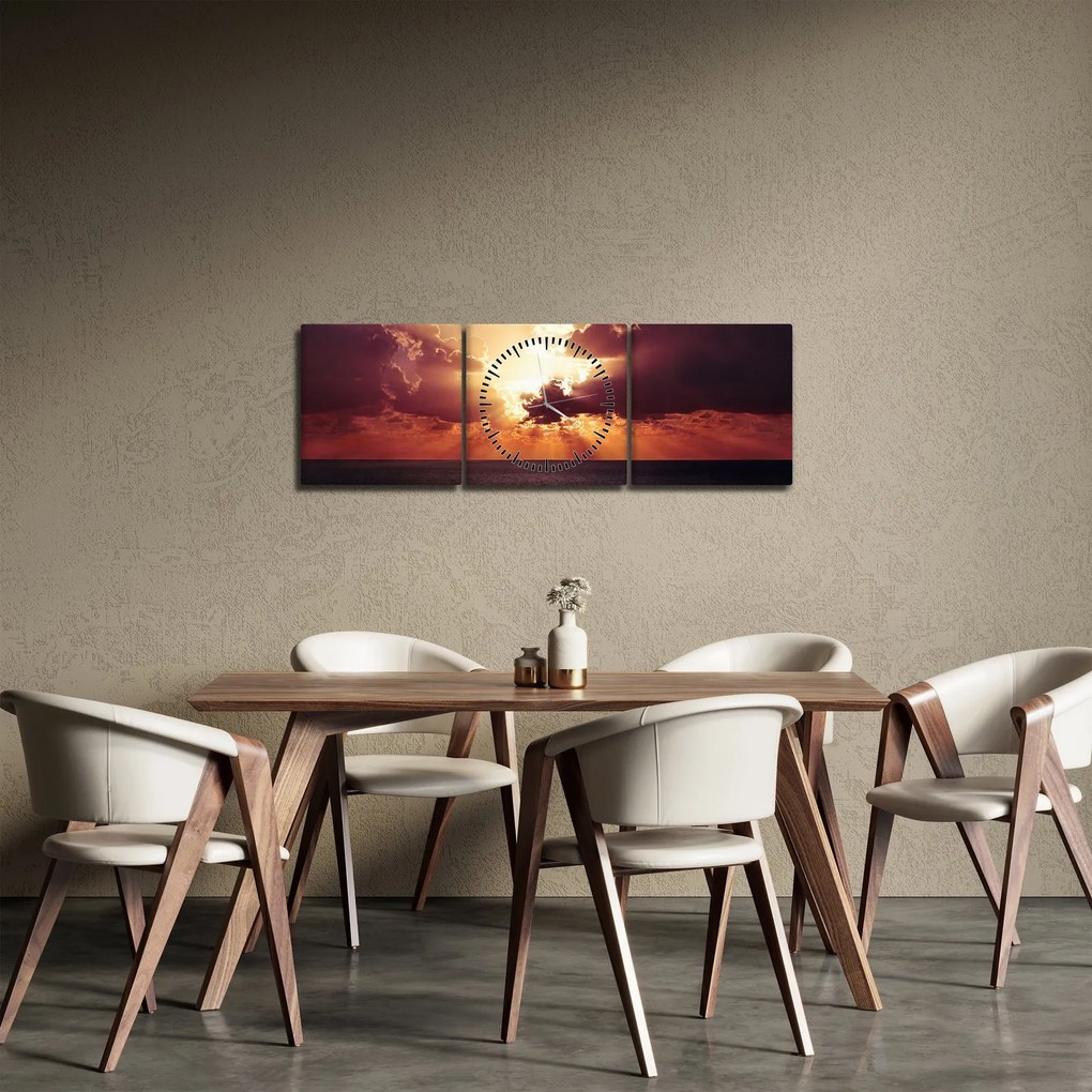 Obraz slnko za mrakmi (s hodinami) (90x30 cm)
