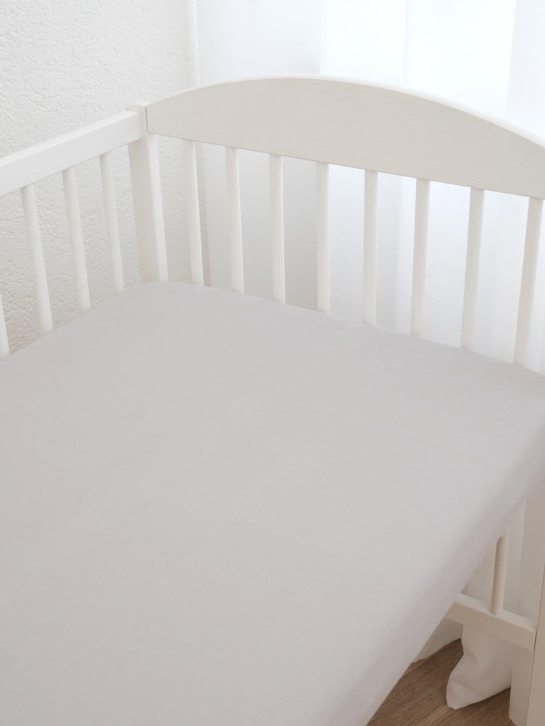 Jersey plachta do postieľky s elastanom Deluxe 70 x 140 cm – svetlosivá