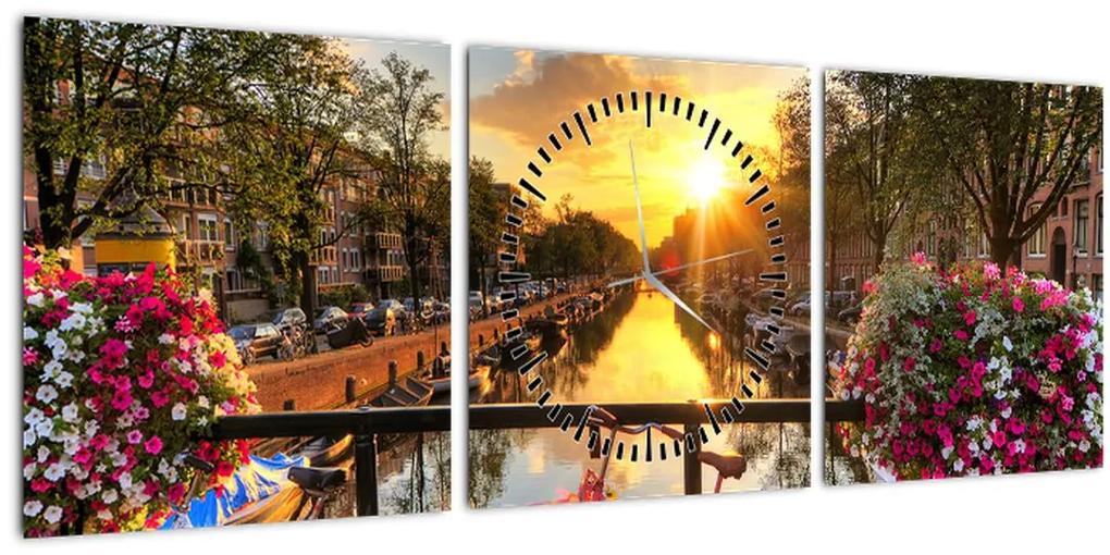 Obraz - Východ slnka v Amsterdame (s hodinami) (90x30 cm)