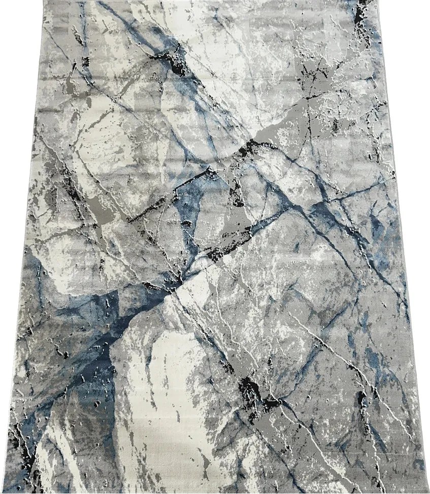 Koberec Pera 3304 BLUE – modrý so sivým abstraktným vzorom Rozmer: 240x330 cm