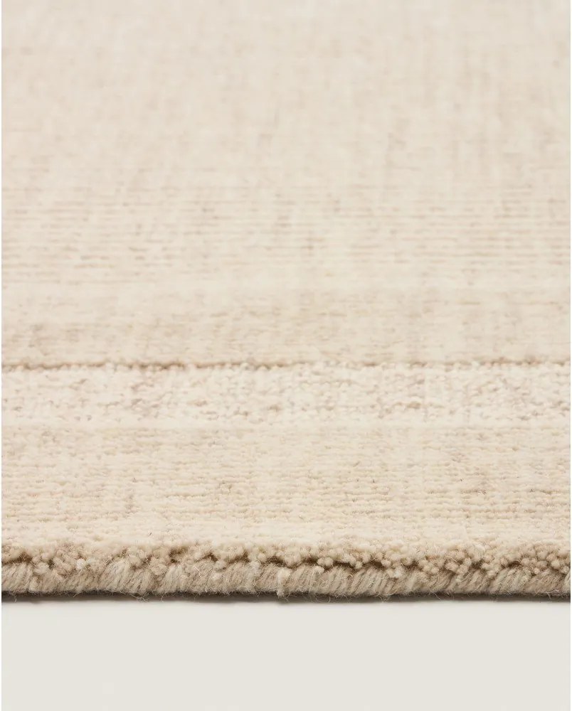 Krémový ručne tkaný vlnený koberec 160x230 cm Dalena – Kave Home