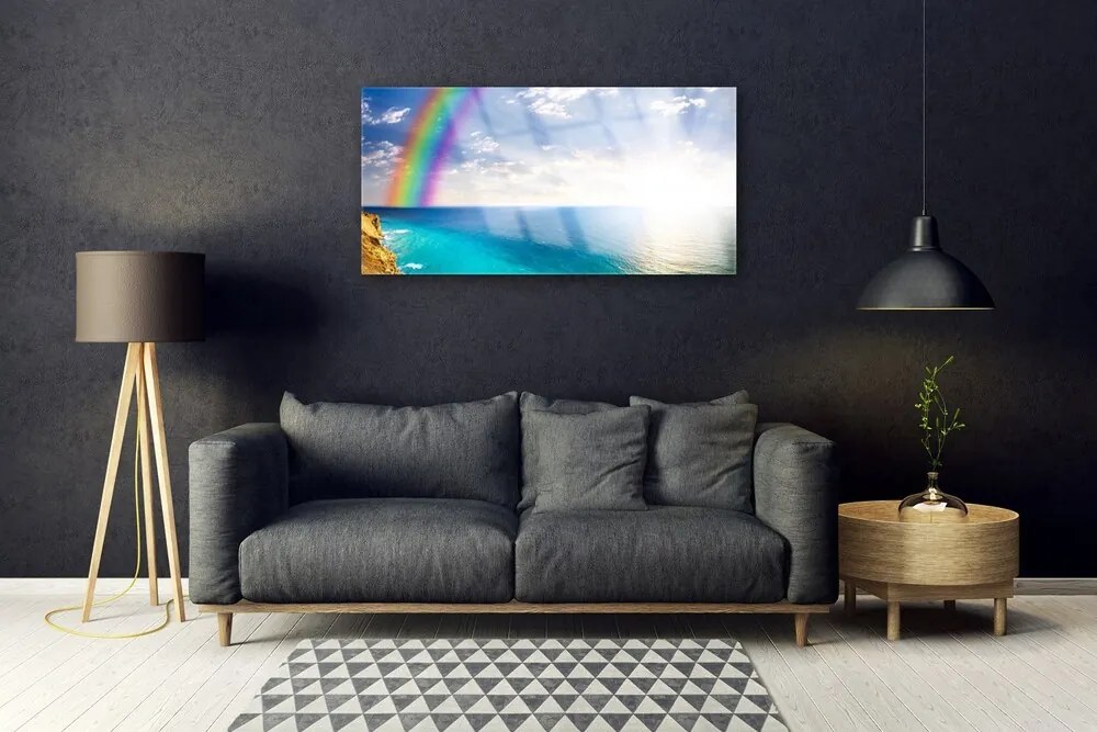 Obraz plexi Dúha u more krajina 100x50 cm