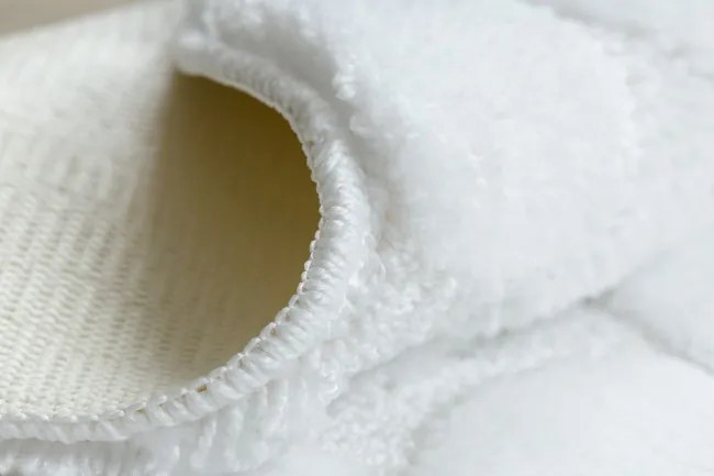 Kúpeľňový koberček SUPREME STONES kamienky, biely kruh