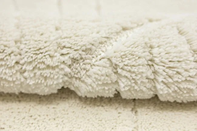 Kúpeľňový koberček Shell krémový