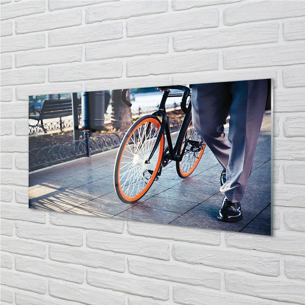 Obraz na skle Mesto na bicykli noha 125x50 cm