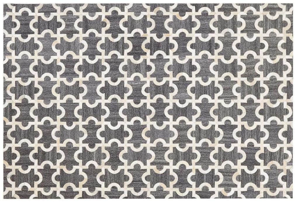 Kožený koberec 140 x 200 cm sivá/béžová YEDISU Beliani