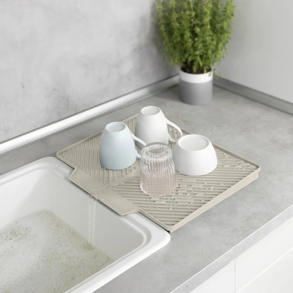 Béžová plastová odkvapkávacia podložka na riad 34x40 cm Nelia – Wenko