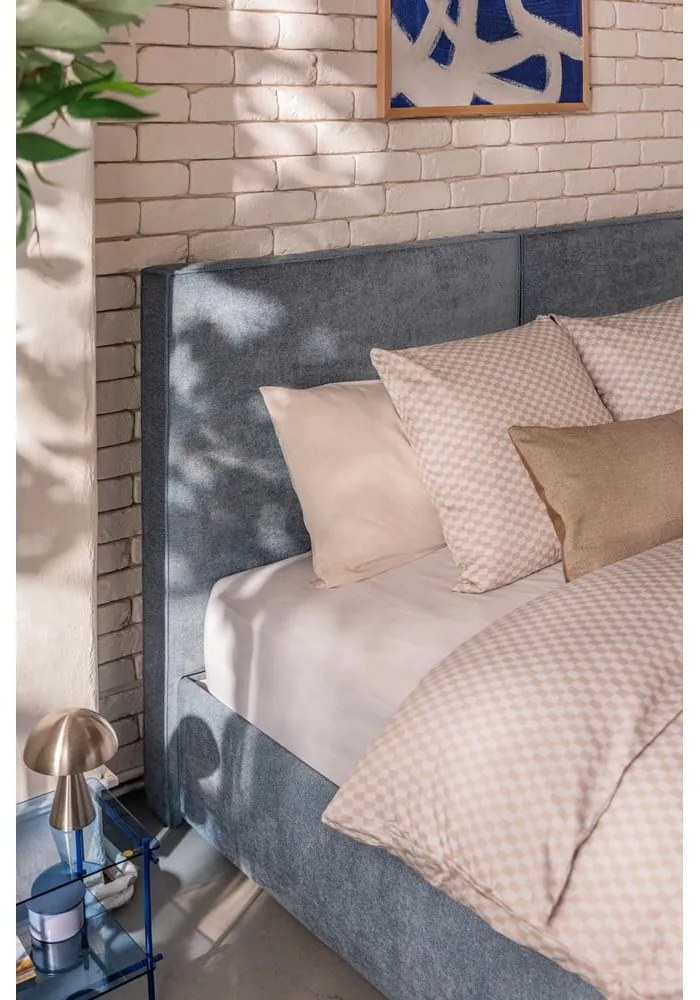 Modrá čalúnená dvojlôžková posteľ s úložným priestorom s roštom 180x200 cm Thessa Bold – Bonami Selection