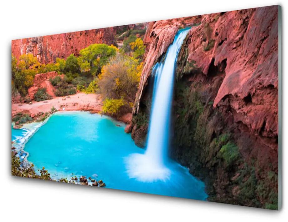 Obraz na skle Vodopád hory príroda 120x60 cm