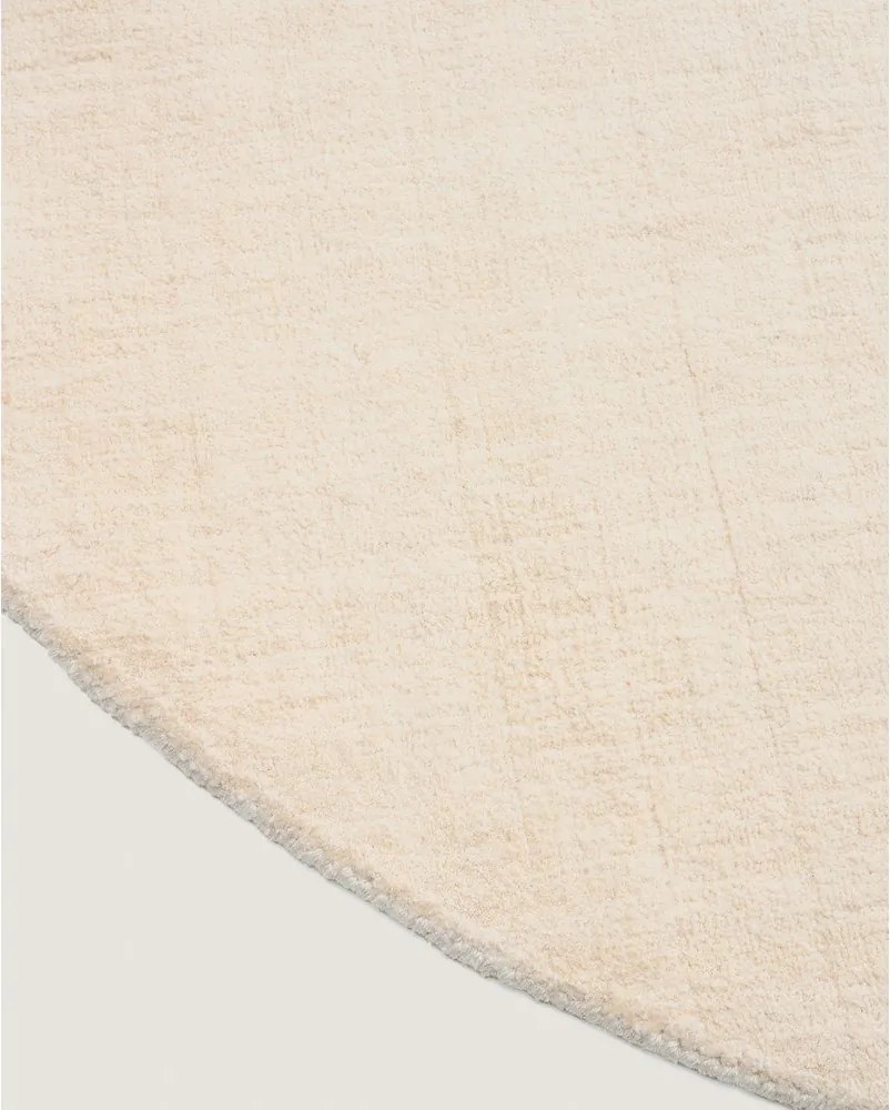 Krémový okrúhly koberec ø 200 cm Empuries – Kave Home