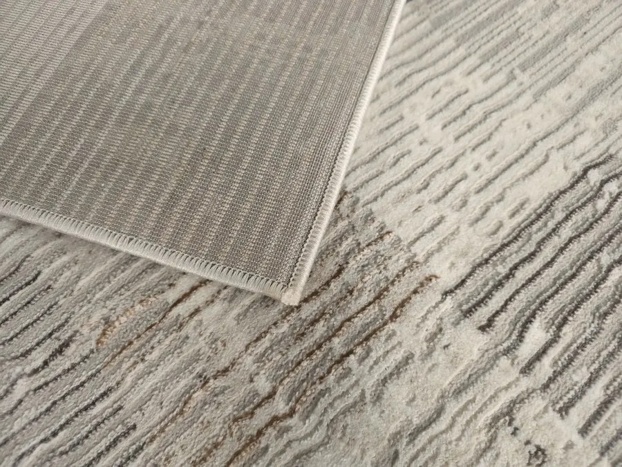 DC Koberec Oman 637 tmavá vizion zlatá Rozmer: 160×220 cm