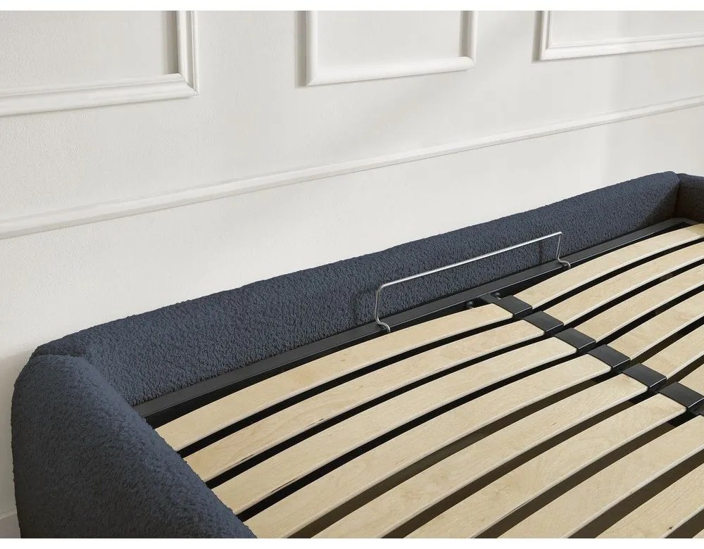 Tmavomodrá čalúnená dvojlôžková posteľ s úložným priestorom/bez čela s roštom 160x200 cm Inera – Bobochic Paris