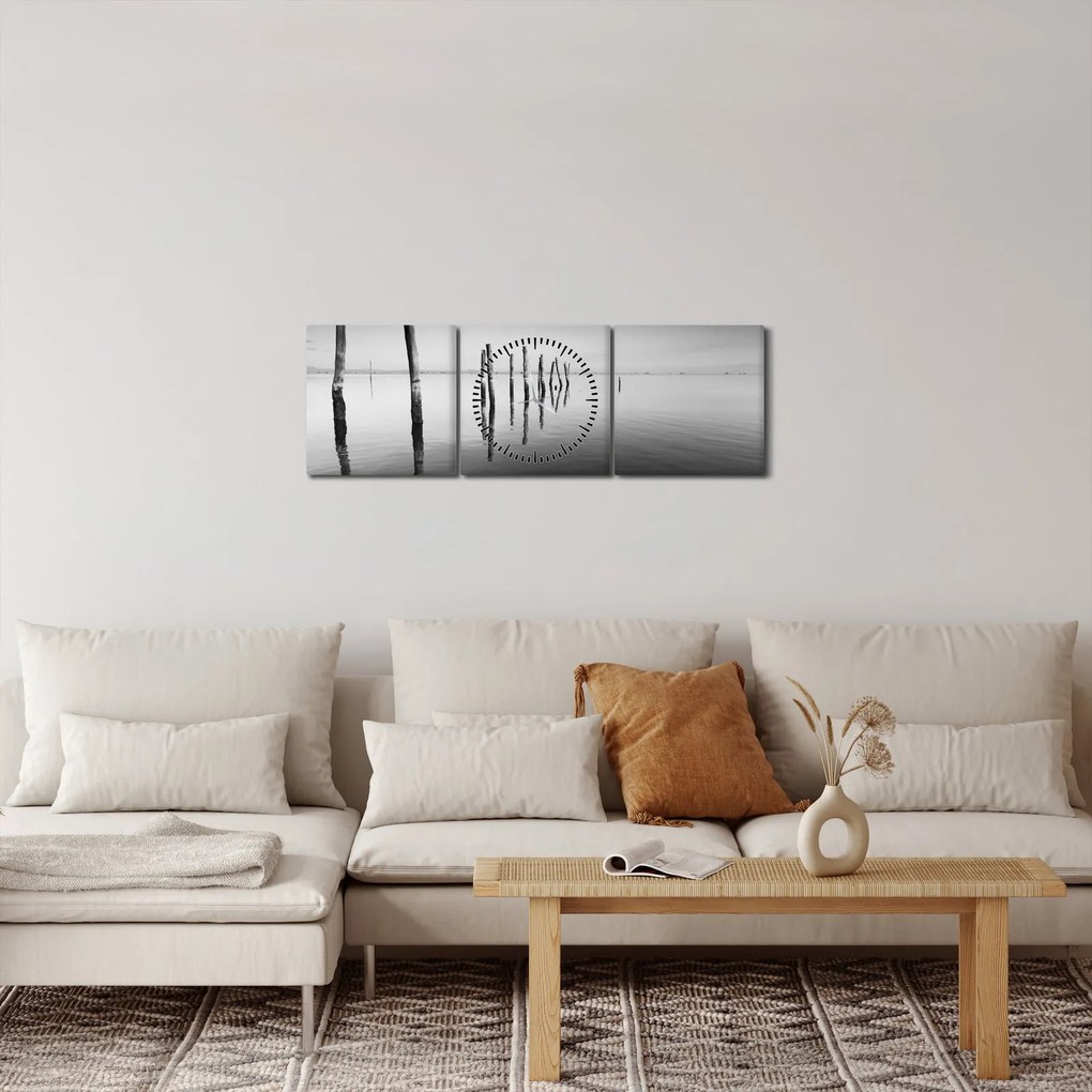 Obraz čiernobielej vodnej hladiny (s hodinami) (90x30 cm)