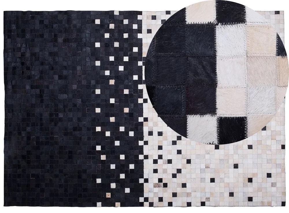 Kožený koberec 160 x 230 cm čierna/béžová ERFELEK Beliani