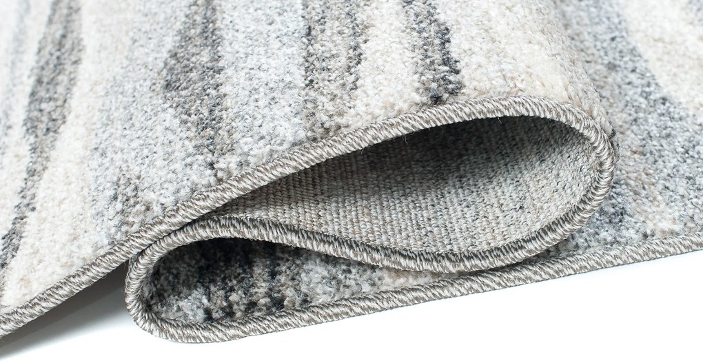 TA Koberec K186A STREDNE SIVÉ SARI B1X Rozmer: 100x300 cm