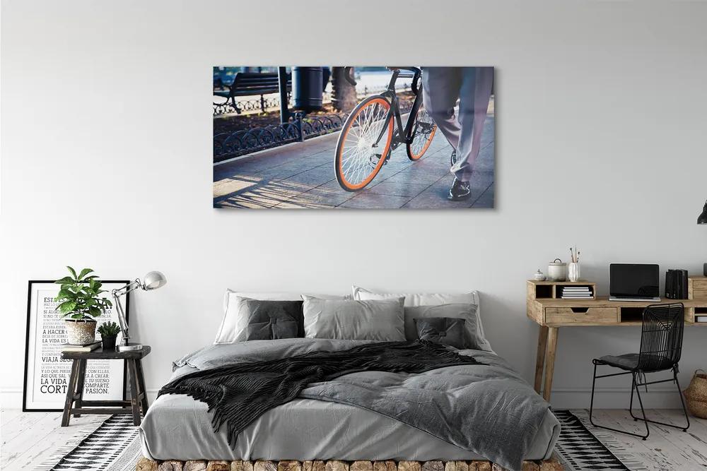 Obraz plexi Mesto na bicykli noha 140x70 cm
