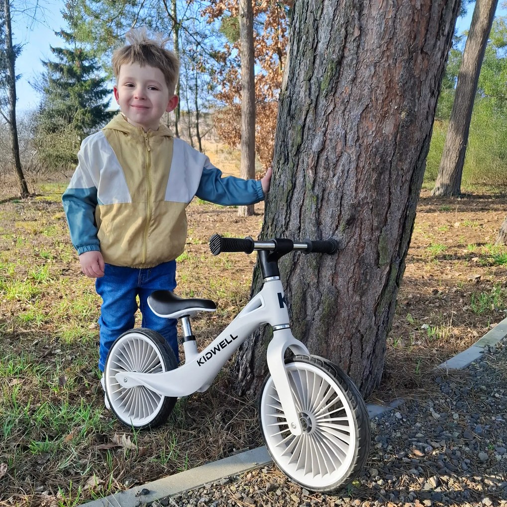 Kidwell NIX detský balančný bicykel – ľahký nylonový rám, PU kolesá 29 cm (sivý)