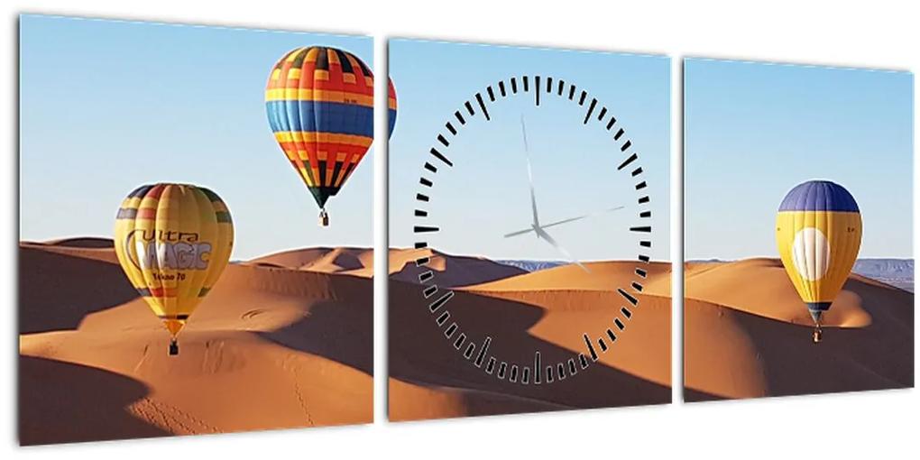 Obraz - lietajúce balóny v púšti (s hodinami) (90x30 cm)