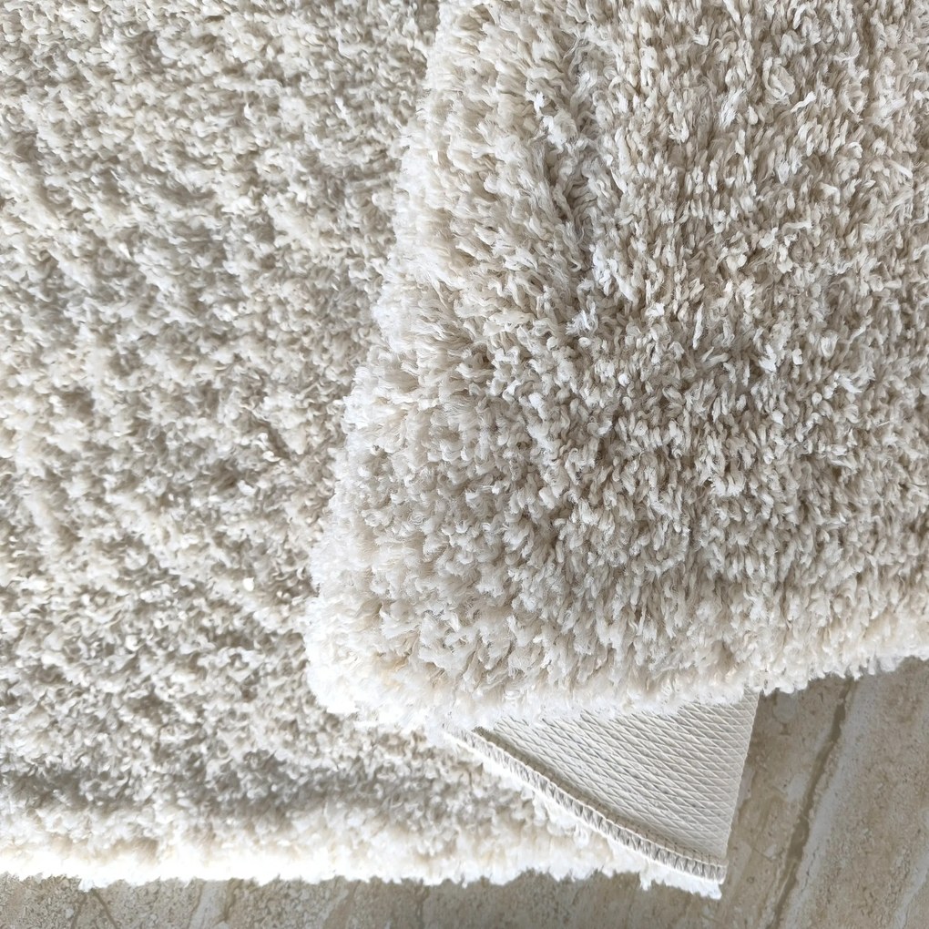 DY Krémový protišmykový shaggy koberec Camel Rozmer: 200x290 cm