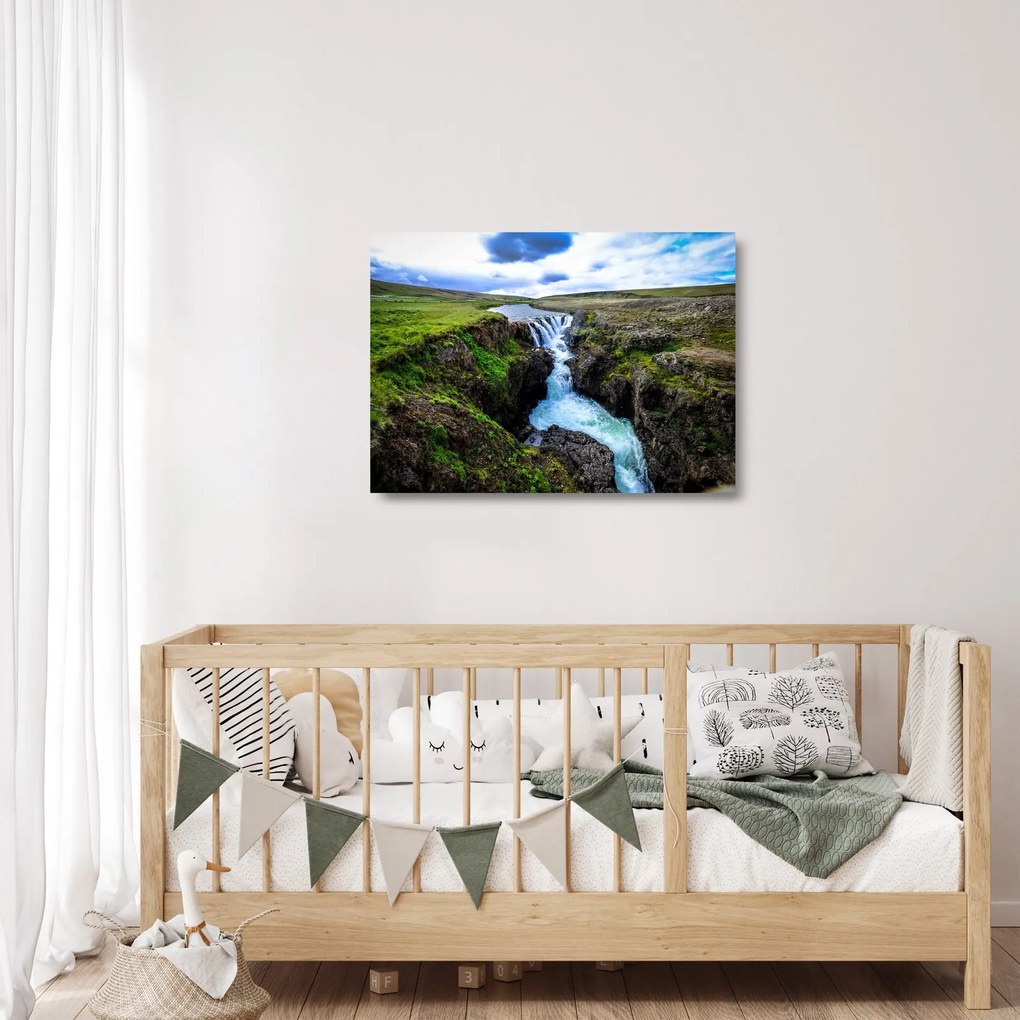 Sklenený obraz vodopádu medzi skalami (70x50 cm)